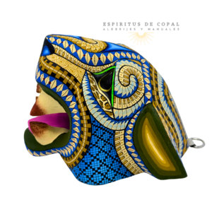 Cabeza azul de felino: Alebrije de cabeza de jaguar en madera de copal con diseños zapotecos